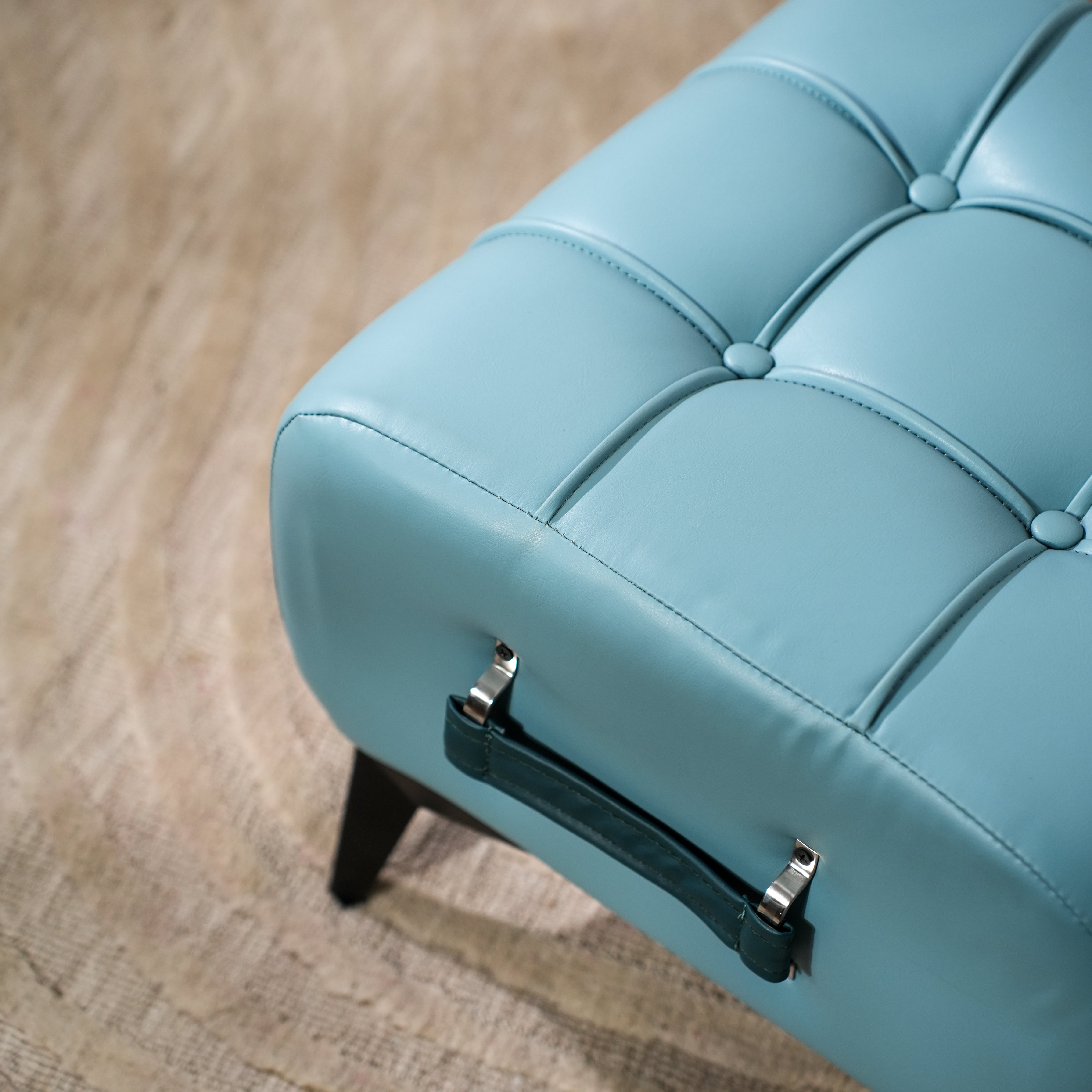 Modern Sky Blue Tufted Ottoman with Dark Blue Handle