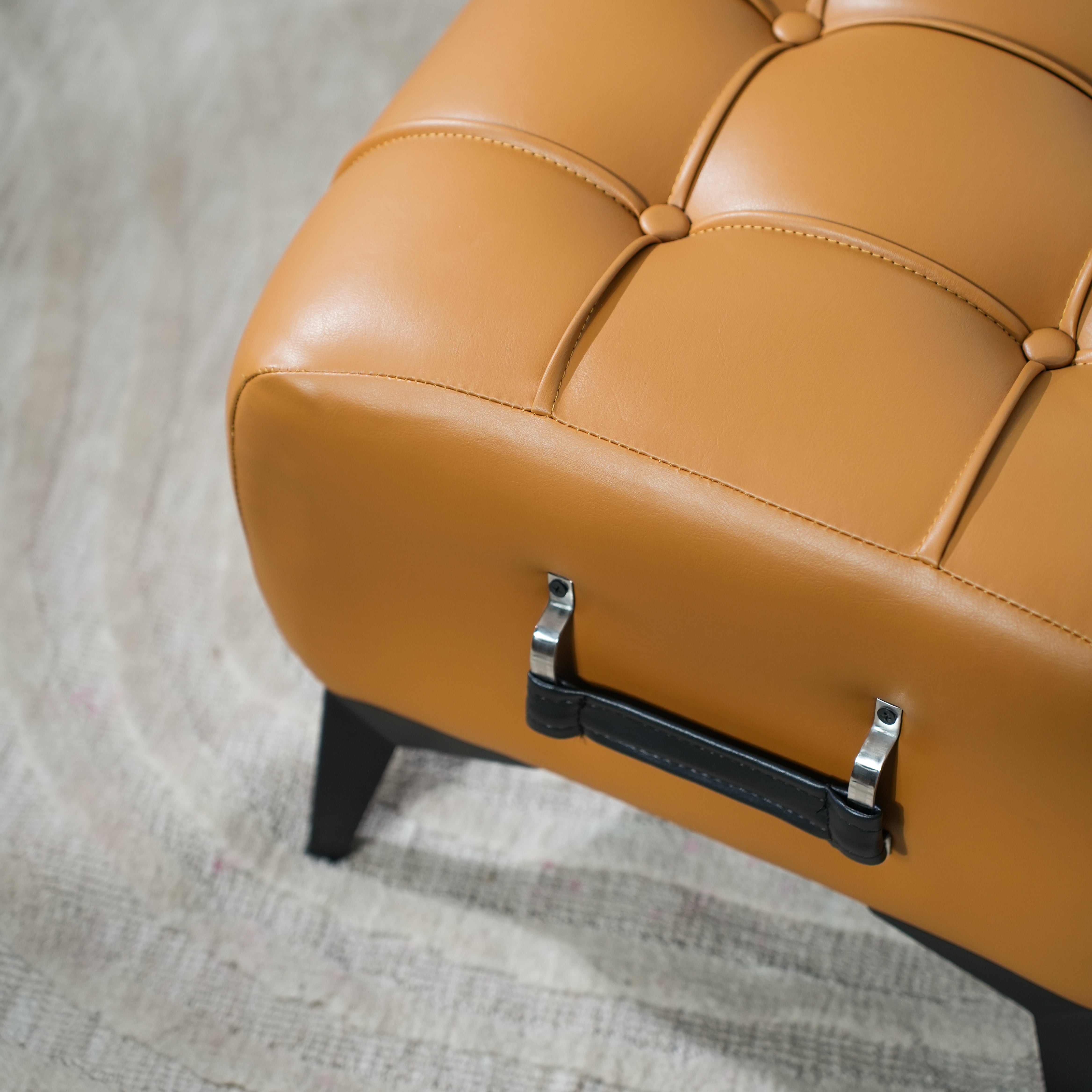 Modern Tan Leather Tufted Ottoman with Black Handle