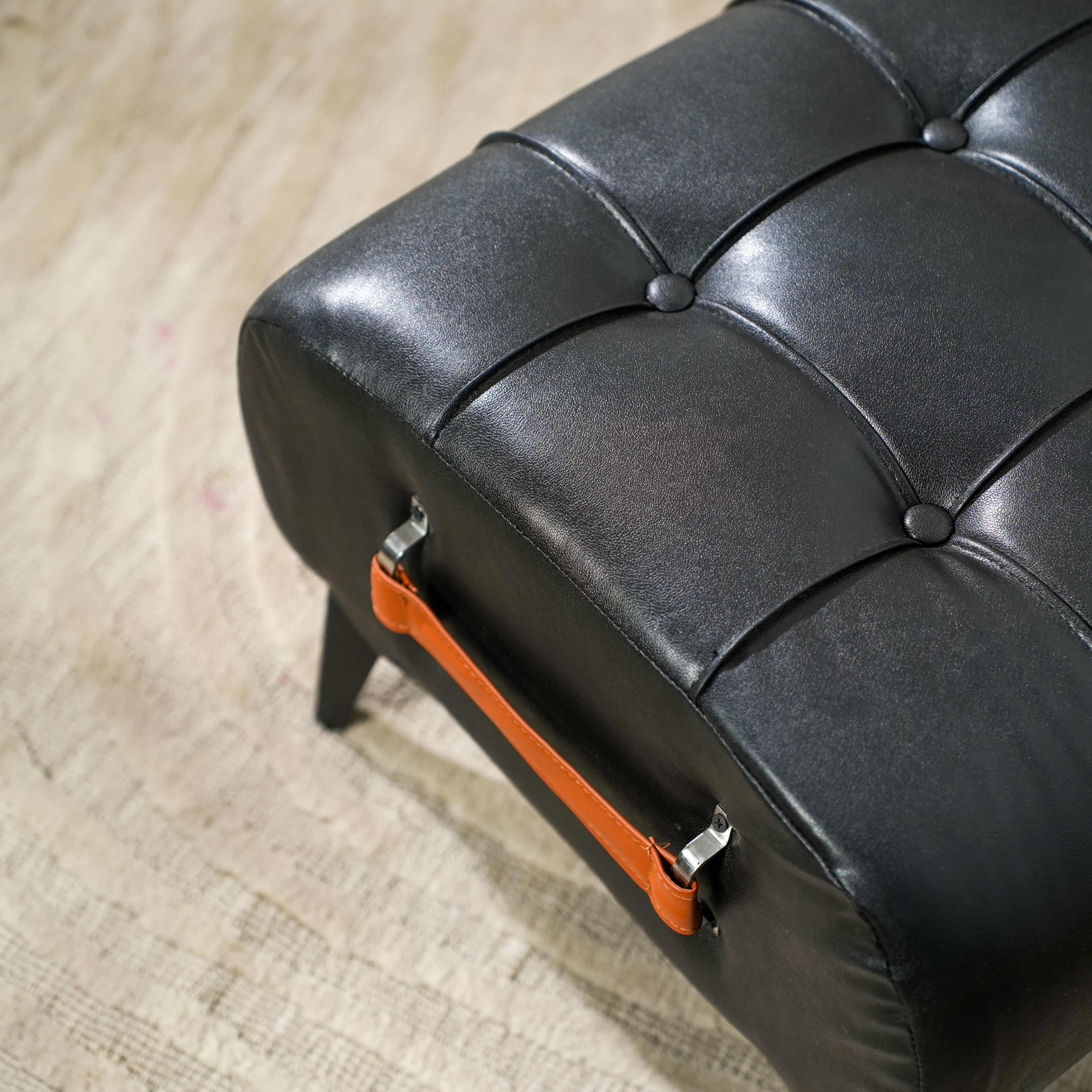Modern Black Leather Tufted Ottoman with Golden Handle